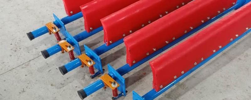 Polyurethane conveyor belt cleaner with blade, transverse shaft and mounting brackets