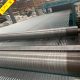 Parallel steel reinforcement cords positioned along a conveyor belt production line